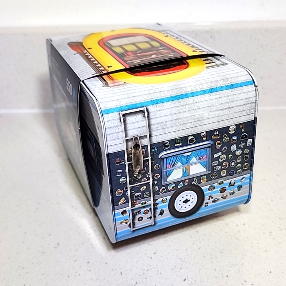 Camping Trailer 550-piece jigsaw puzzle, packaged in a collectible tin. New